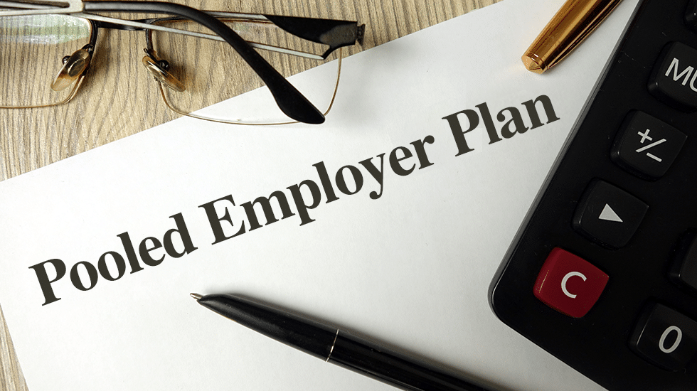 A document titled "Pooled Employer Plan" next to glasses, a pen, and a calculator.